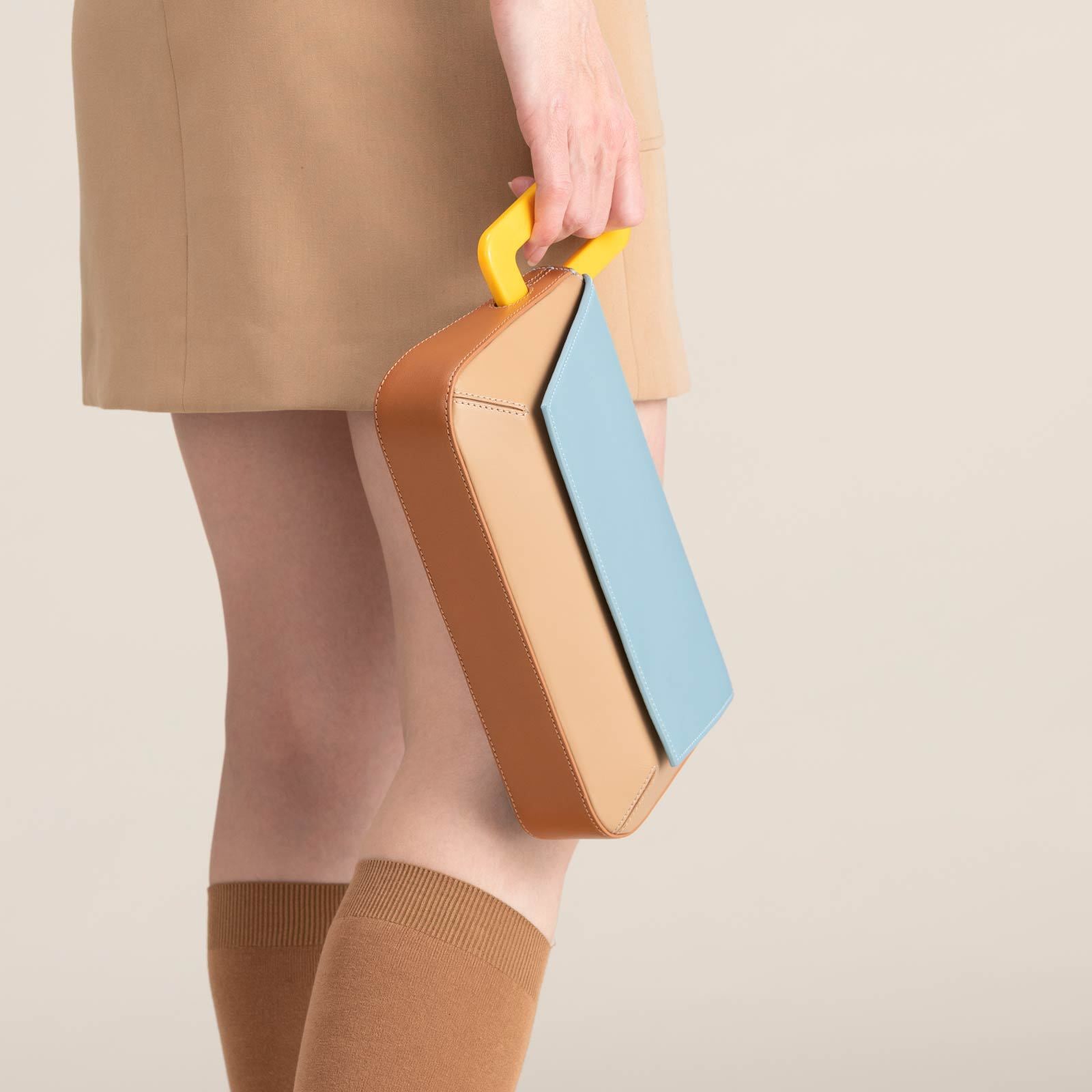 Geometric resin top handle detail on patchwork bag – ARLANA