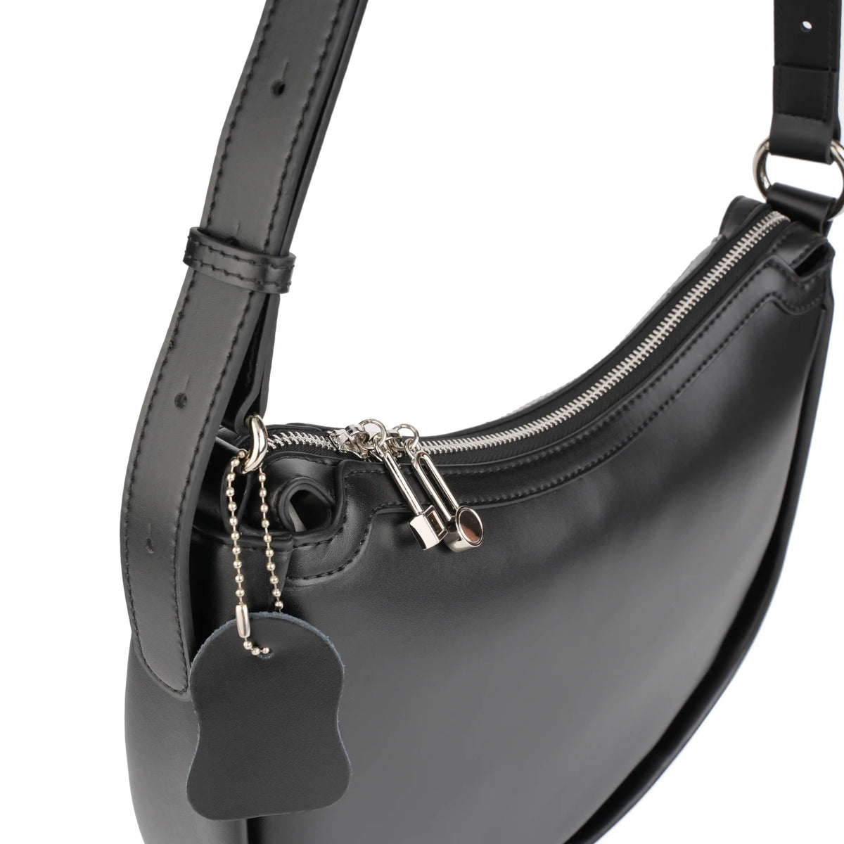 Adjustable shoulder strap detail on vegan leather bag – ARLANA