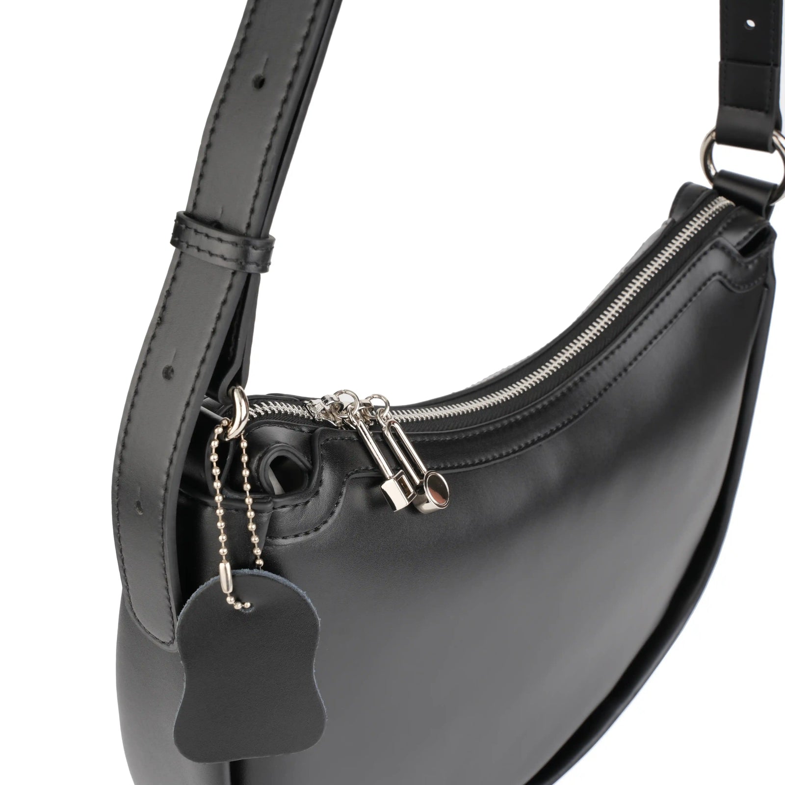 Adjustable shoulder strap detail on vegan leather bag – ARLANA