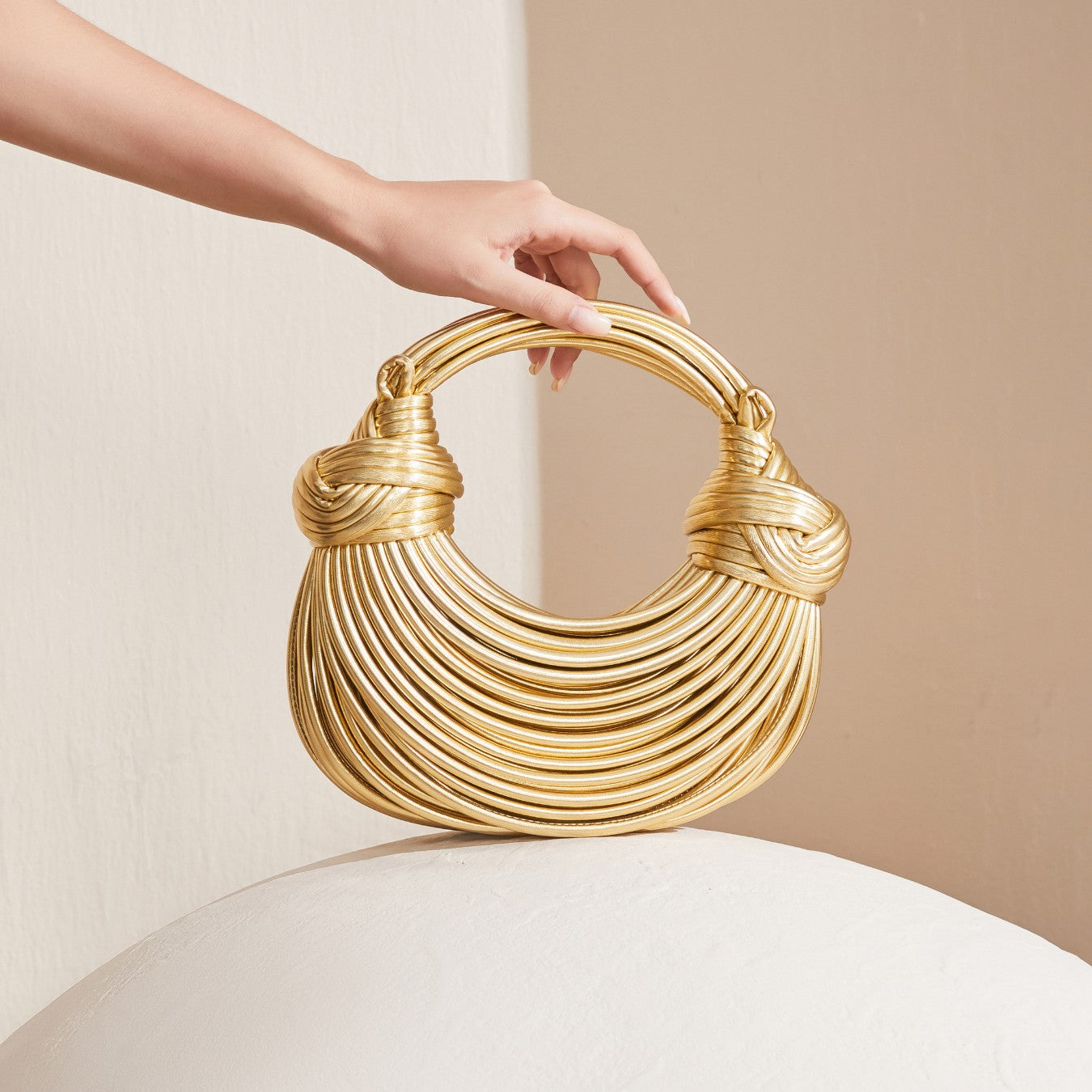 Close-up of ribbed coil texture on sculptural handbag – ARLANA