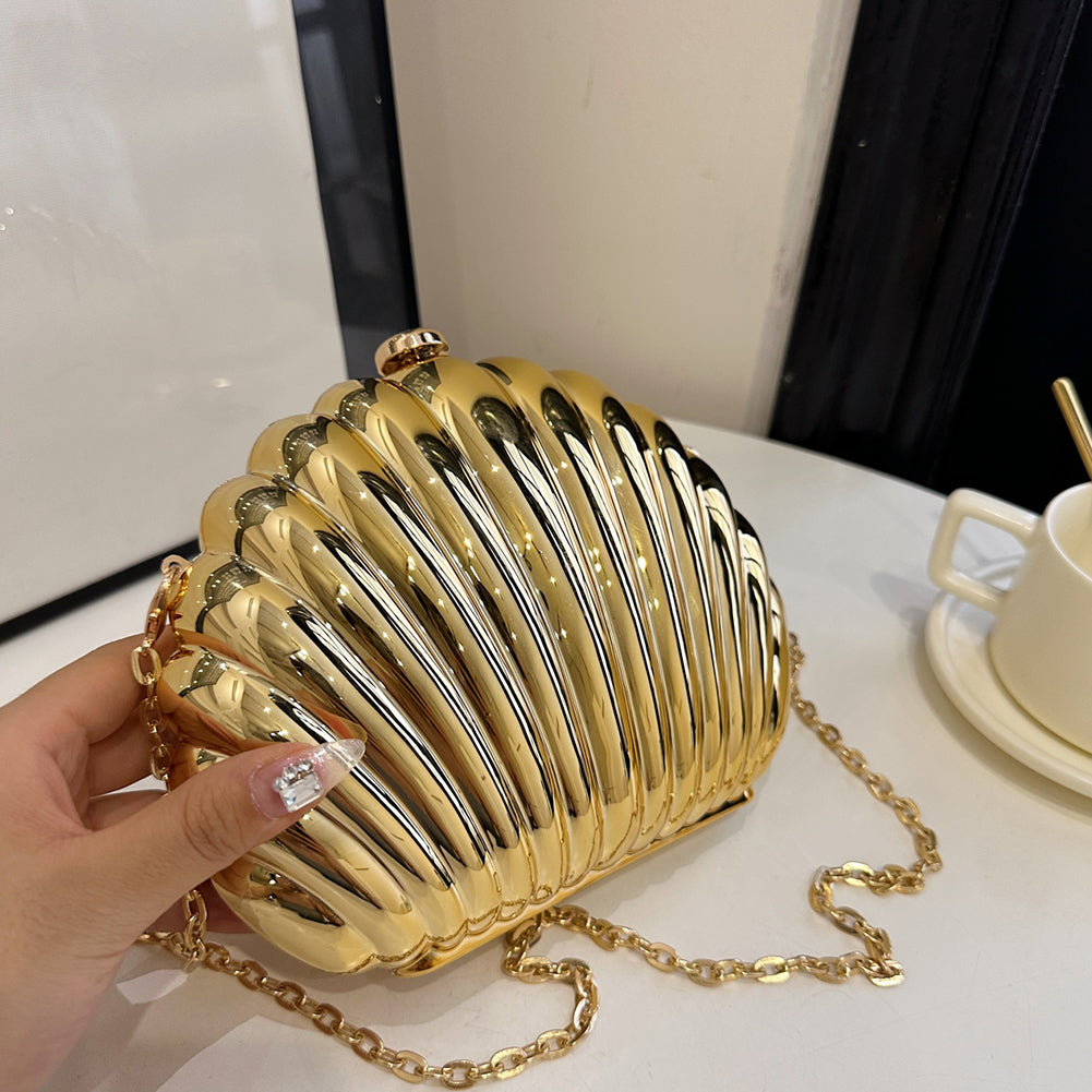 Shell shaped clutch bags in gold, silver and black – ARLANA